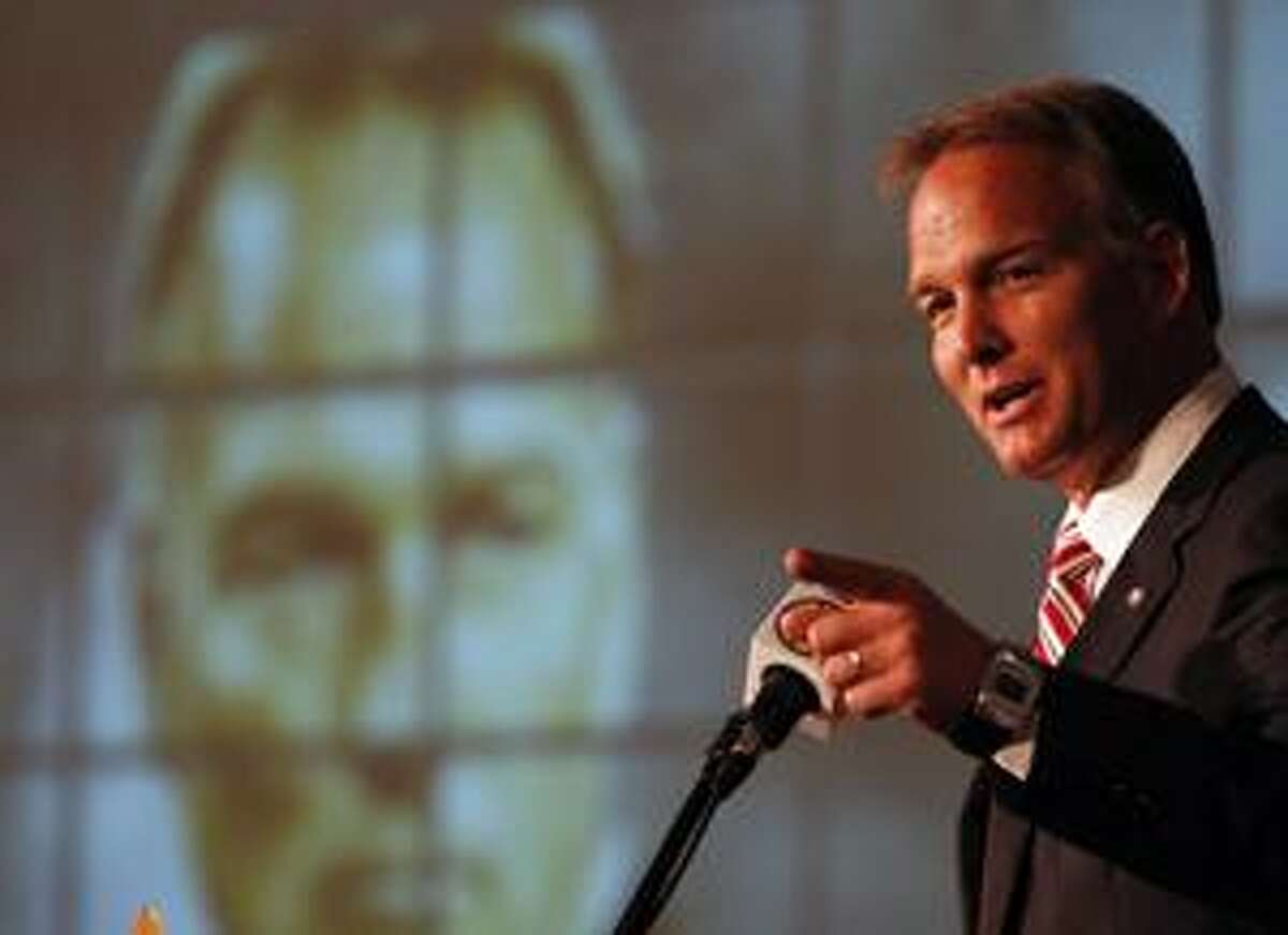 Georgia Head Coach Mark Richt talks to the media during the Southeastern Conference football media days on Thursday, July 22, 2010, in Hoover, Ala. (AP Photo/ Butch Dill)