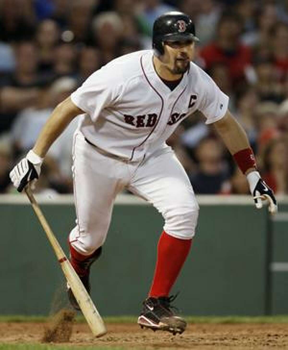 At Fenway Park, Red Sox catcher Jason Varitek holds his game
