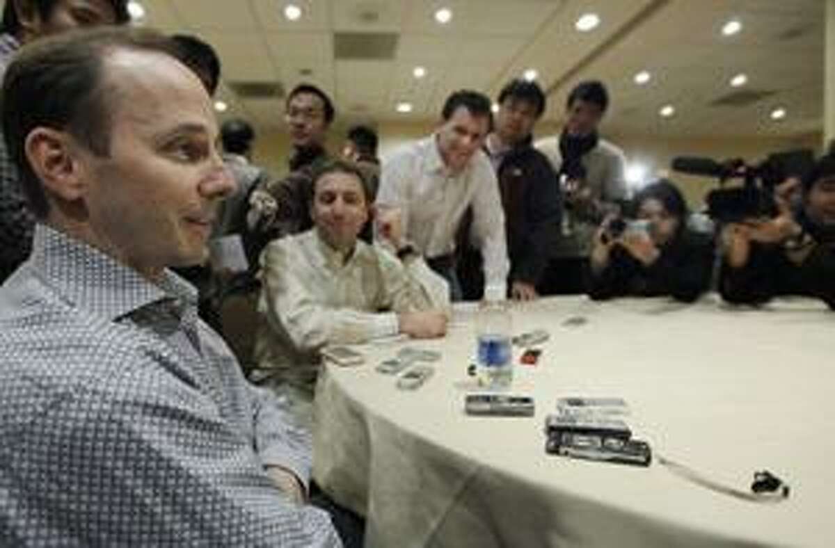 AP New York Yankees general manager Brian Cashman talks to the media during Major League Baseball's 2009 General Managers Meetings, Tuesday in Chicago.