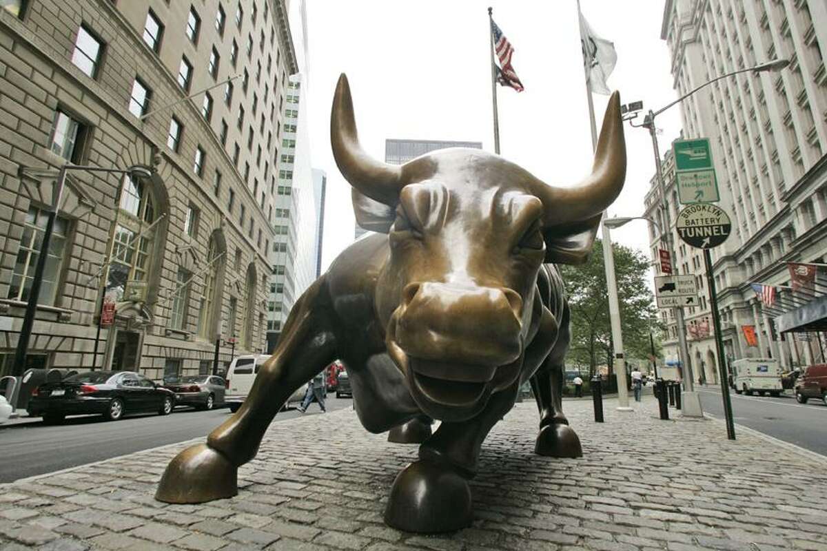 FILE - In this Oct. 18, 2006 file photo, the charging bull is seen in lower Manhattan in New York. They are the biggest of the big _ the Citigroups, the Goldman Sachses, the AIGs and other behemoths of the financial system. The Obama administration doesn't want so many around anymore. (AP Photo/Mary Altaffer, FILE)