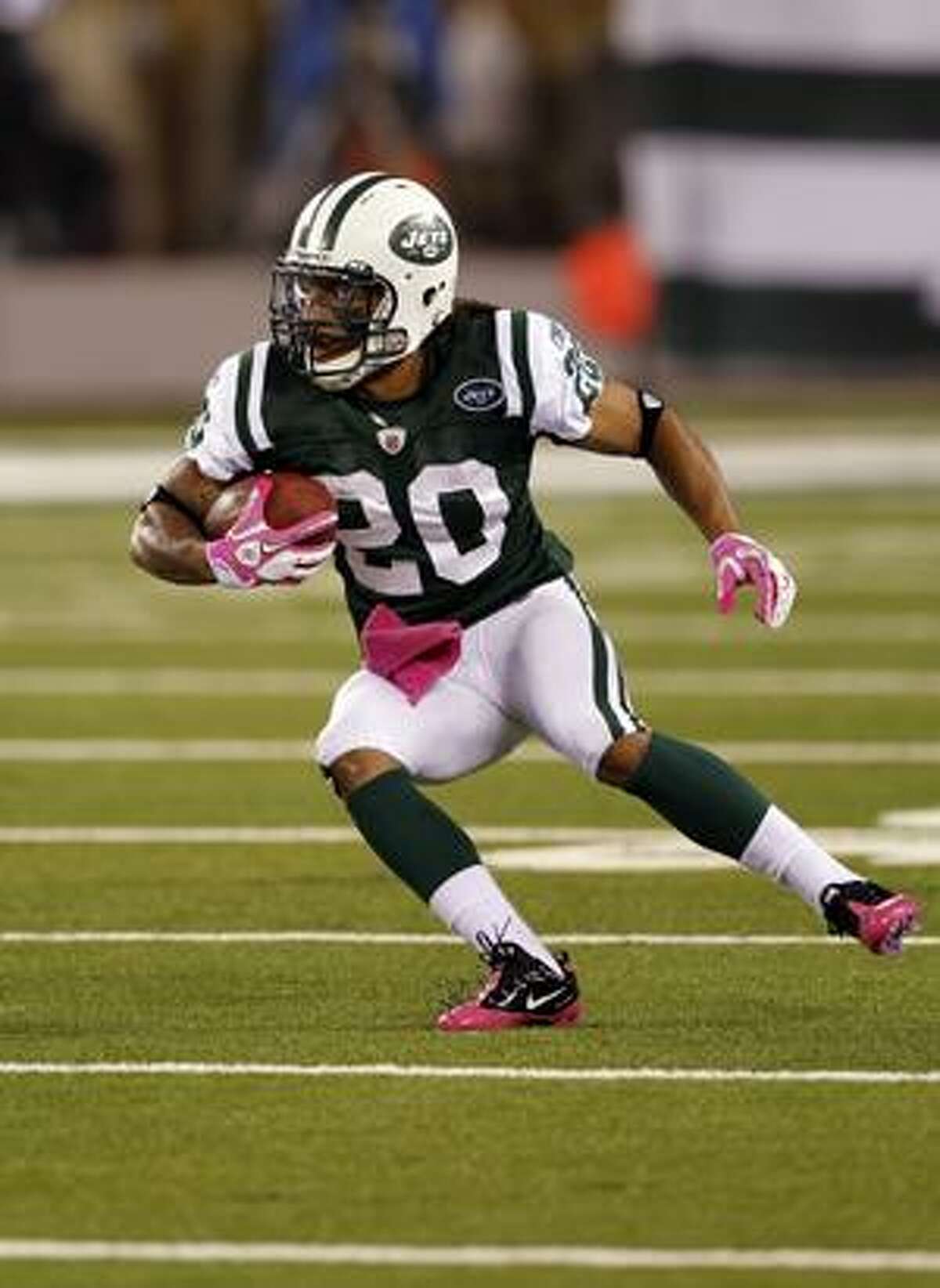 New York Jets punt returner Kyle Wilson (20) returns a punt during the NFL week 5 ESPN Monday Night Football game against the Minnesota Vikings on Monday, October 11, 2010 in East Rutherford, New Jersey. The Jets won the game 29-20. (AP Photo/Paul Spinelli)