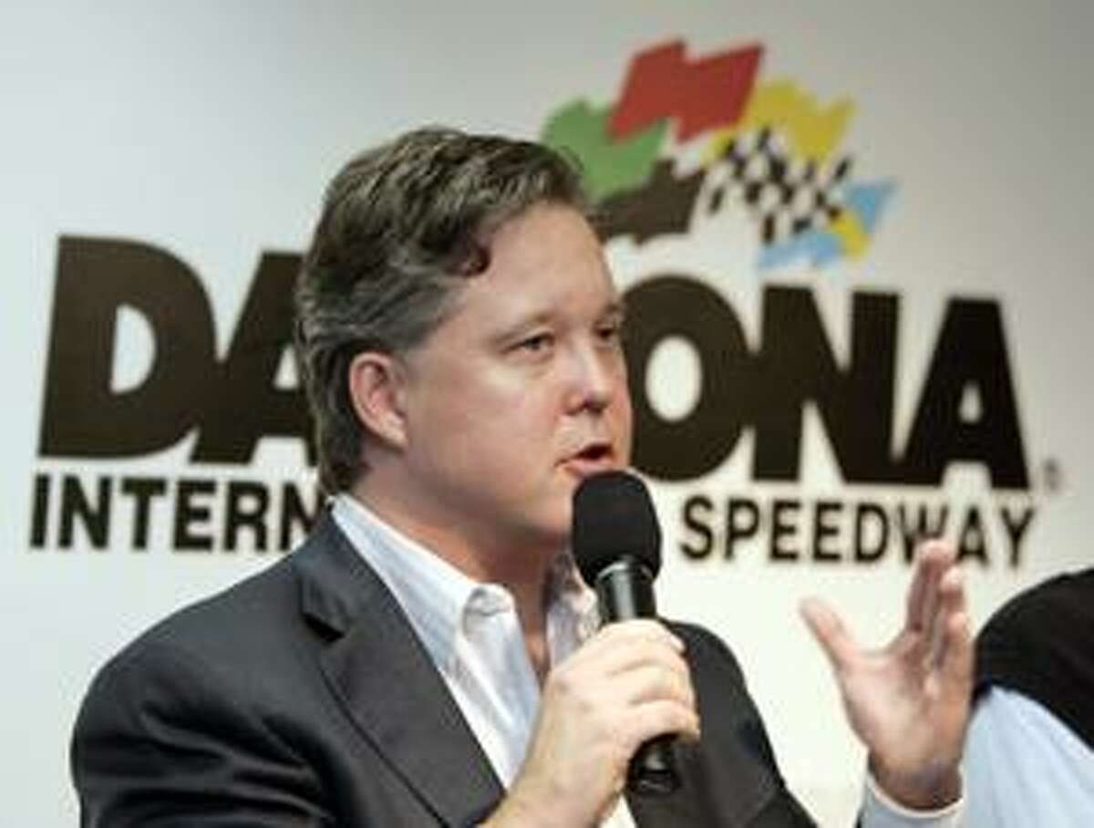 FILE - In this June 29, 2006 photo, NASCAR chairman Brian France gestures during a news conference at the Daytona International Speedway in Daytona Beach, Fla. NASCAR fans are reluctant to change. NASCAR chairman Brian France will have to keep that in mind when he decides on altering the championship format for a third time in six years. (AP Photo/Alan Diaz)