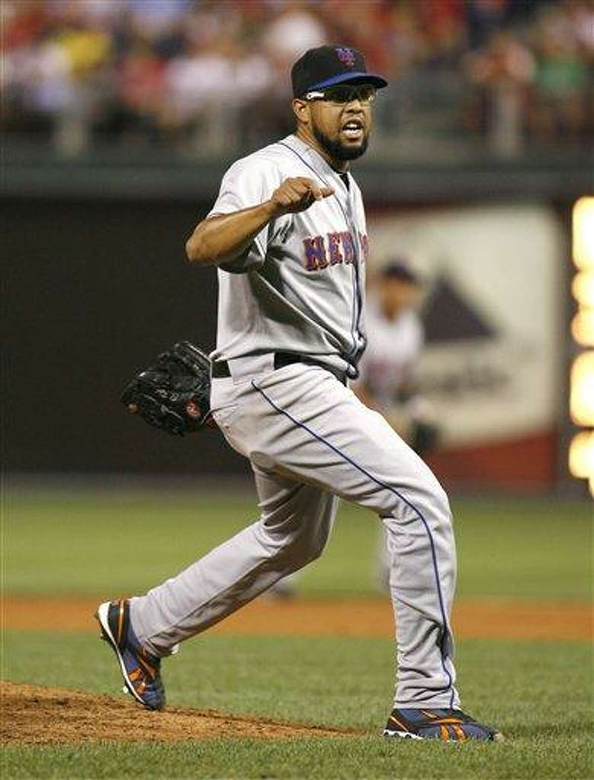 FILE - New York Mets pitcher Francisco Rodriguez celebrates after striking out Philadelphia Phillies' Domonic Brown to end the ninth inning of a baseball game in this Aug. 7, 2010 file photo taken in Philadelphia. Rodriguez is in custody after what police called a "physical assault" with his father-in-law after the Mets' 6-2 loss to the Colorado Rockies at Citi Field Wednesday Aug. 11, 2010. (AP Photo/H. Rumph Jr, File)