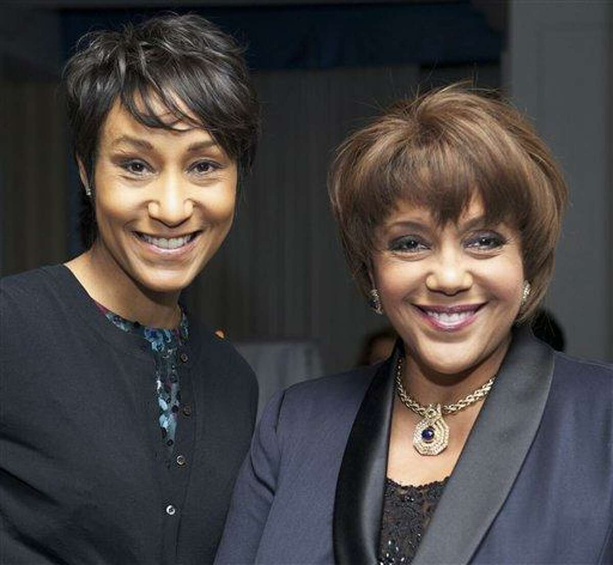 FILE - In this file photo taken March 4, 2010 in New York, former White House Social Secretary Desiree Rogers, left, poses with Johnson Publishing Inc. CEO Linda Johnson Rice as they attend UNCF 66th Anniversary dinner. Rice named Rogers the chief executive officer at Johnson Publishing Tuesday, Aug. 10, 2010, citing her confidence and business savvy. The Chicago-based company publishes Ebony and Jet magazines. (AP Photo/Earl Gibson III, File)