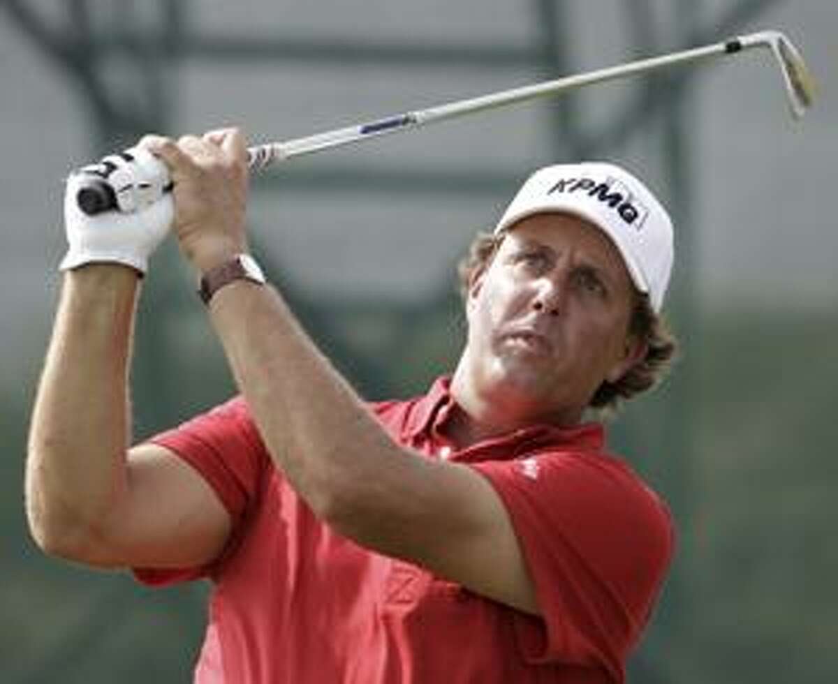 Phil Mickelson hits a drive on the seventh hole during a practice round for the PGA Championship golf tournament Tuesday, Aug. 10, 2010, at Whistling Straits in Haven, Wis. (AP Photo/Eric Gay)