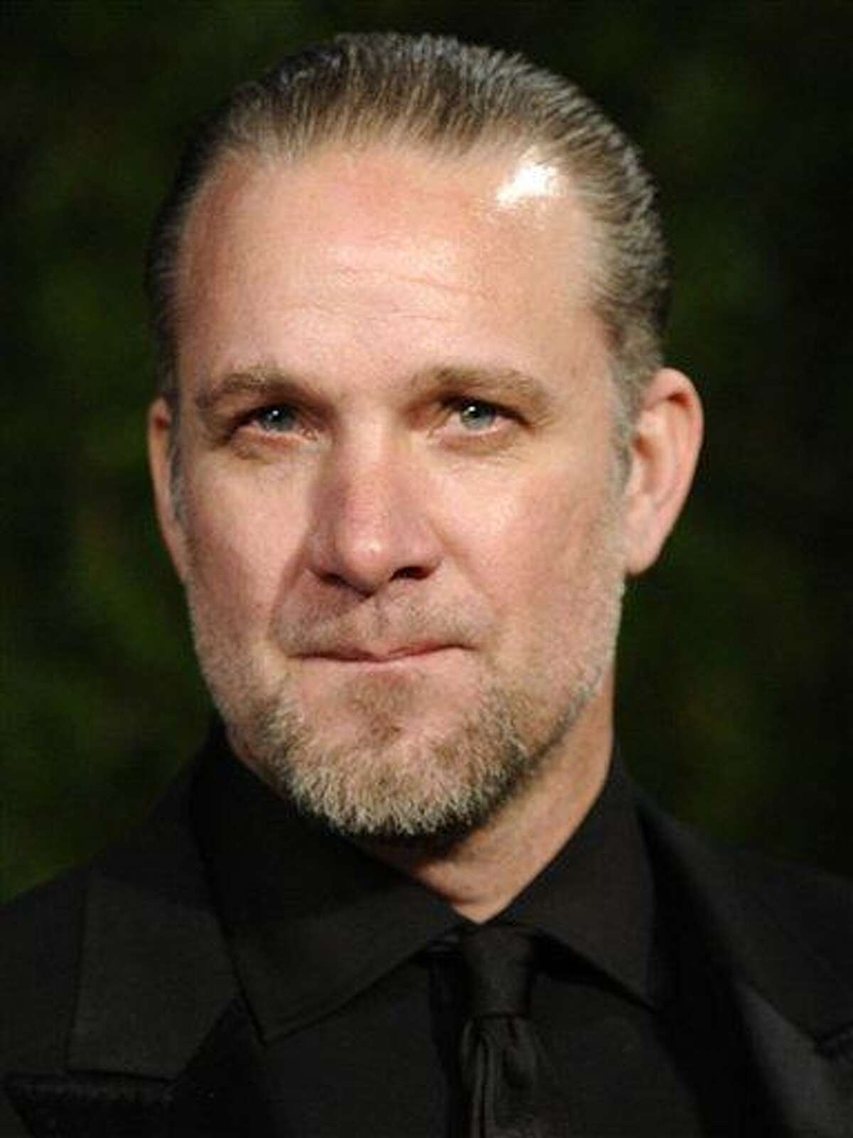 This photo taken March 7, 2010 shows Jesse James arriving for the Vanity Fair Oscar party in West Hollywood, Calif. Joe Yanny told The Associated Press that allegations of marital infidelity against James and the ensuing media "feeding frenzy" have ruined the biker businessman's life. James is married to actress Sandra Bullock. (AP Photo/Peter Kramer)