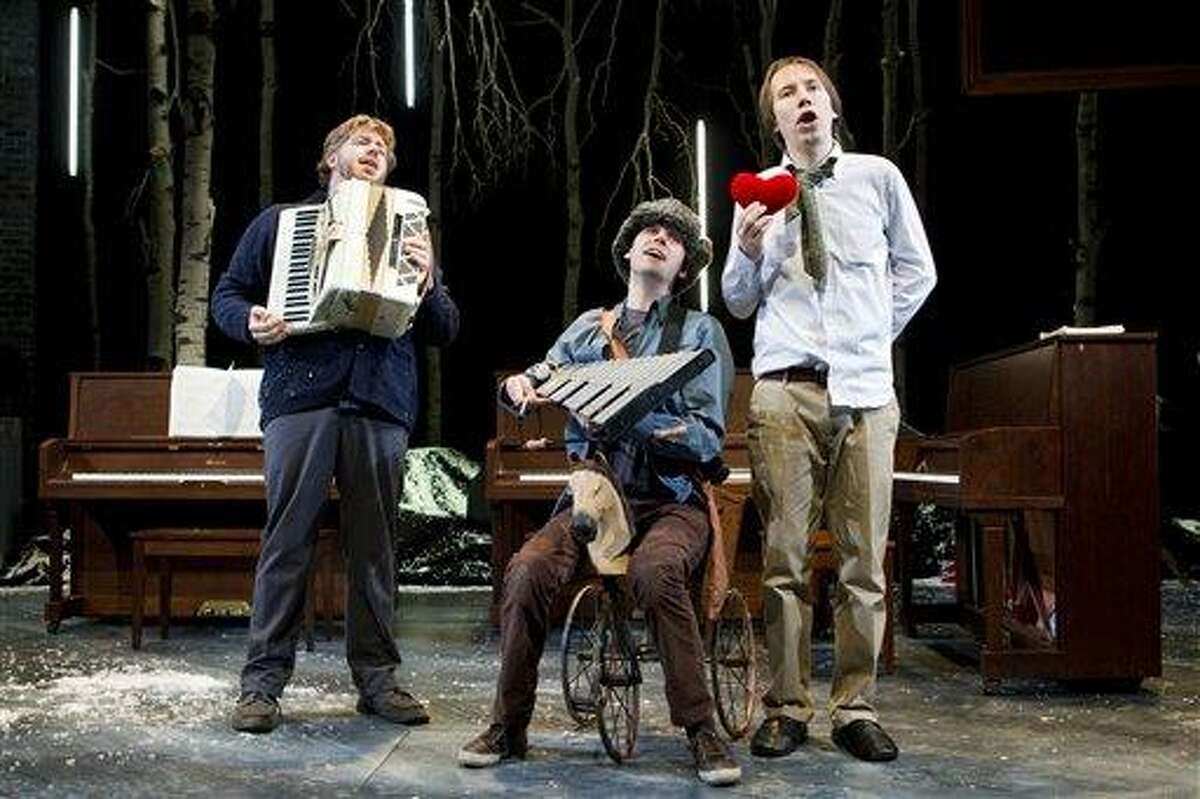 In this publicity image released by Richard Kornberg & Associates, from left, Dave Malloy, Alec Duffy and Rick Burkhardt are shown in a scene from "Three Pianos," performing off-Broadway at New York Theatre Workshop in New York. (AP Photo/Richard Kornberg & Associates, Joan Marcus)
