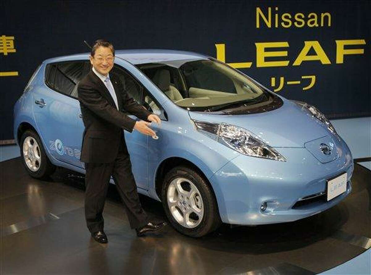 Nissan Motor Co. Chief Operating Officer Toshiyuki Shiga introduces the company's zero-emission electric car, Leaf, during a news conference at its headquarters in Yokohama, Japan, Friday, Dec. 3, 2010. (AP Photo/Itsuo Inouye)