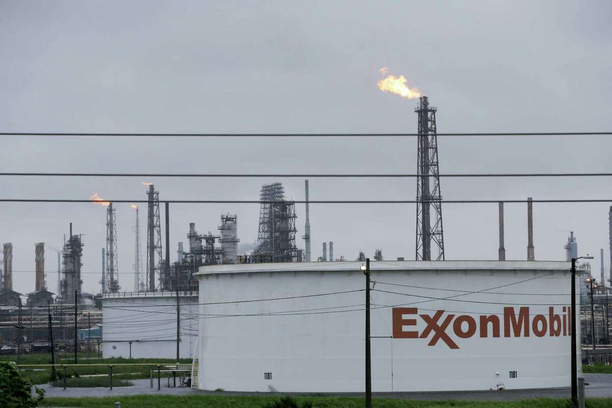 Flares are shown at the ExxonMobil refining complex in Baytown Tuesday, August 29, 2017. Several plants shut down due to Hurricane Harvey.