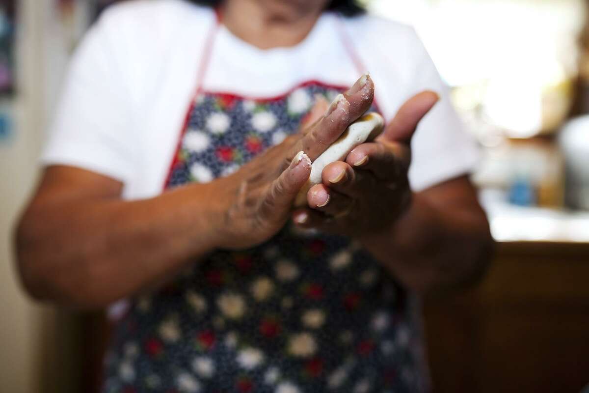 Jenelle Esparza's photos documenting cooks making traditional foods are part of “Entre La Sombra: Living Along the Missions,” an art exhibit that's part of the World Heritage Festival.