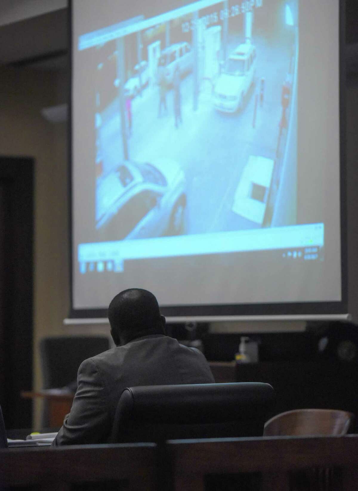 William Porter, accused of murder in the Christmas 2015 death of Trayvouns Edwards, watches a video of the event at which he allegedly shot Edward, in 186th District Court on Tuesday, Aug. 29, 2017.
