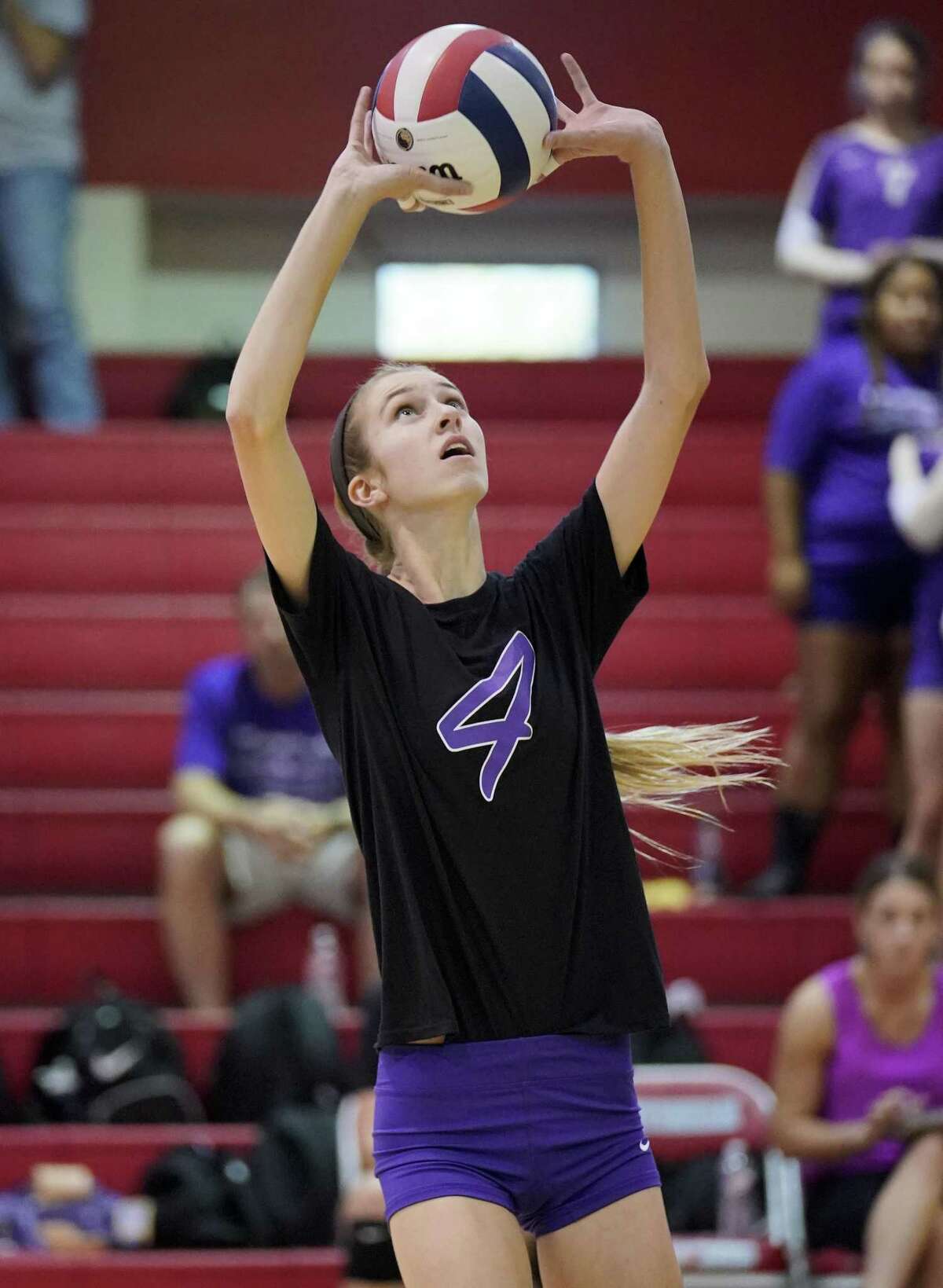 Navarro's Bailey Wosniak serves against Antonian, Tuesday, Aug. 29, 2017, at Antonian gym in San Antonio. (Darren Abate/For the Express-News)