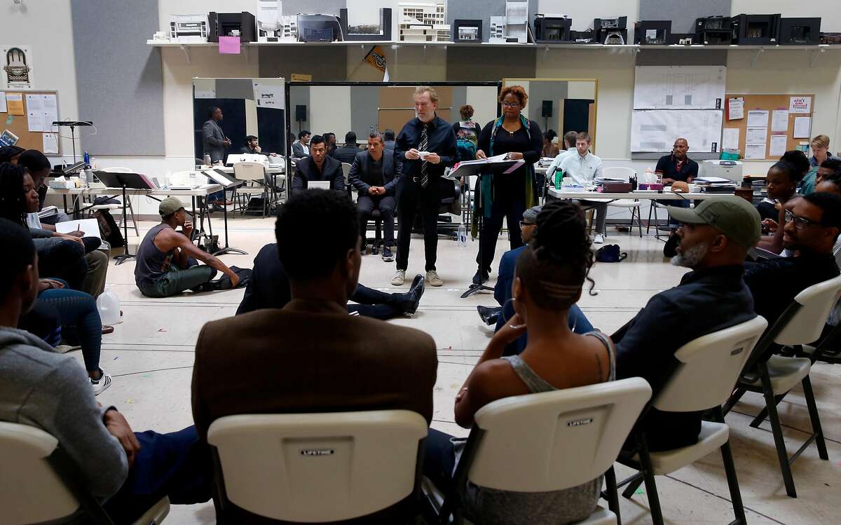 Director Des McAnuff (center) meets with the cast during a break in a rehearsal for "Ain't Too Proud: The Temptations Musical" at the Berkeley Rep rehearsal studio in Berkeley, Calif. on Wednesday, Aug. 2, 2017.