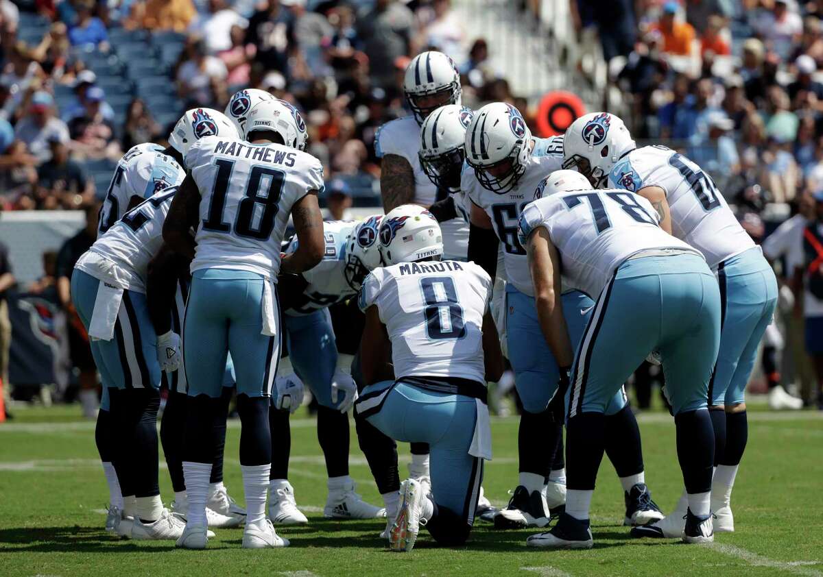 Tennessee Titans quarterback Marcus Mariota (8) calls a play in the first half of an NFL football preseason game against the Chicago Bears Sunday, Aug. 27, 2017, in Nashville, Tenn. (AP Photo/James Kenney)