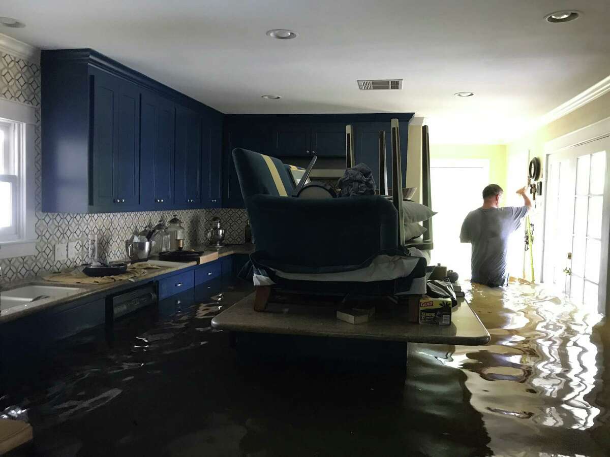 The Meyerland home of Janus and John Lazaris flooded during Tropical Storm Harvey.