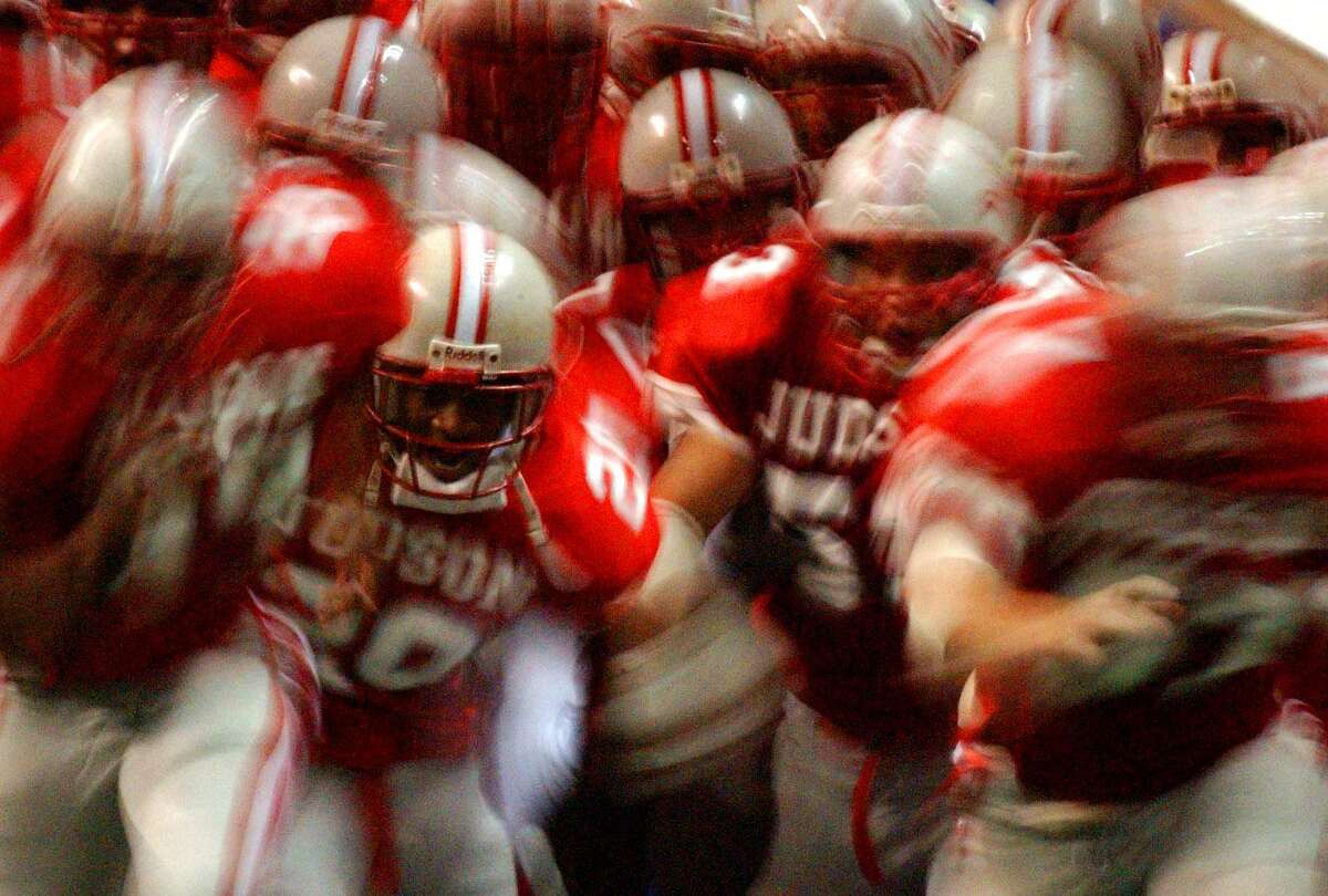 The Judson Rockets make their way onto the field on Nov. 24 , 2001, at the Alamodome before their game against the Taft Raiders.