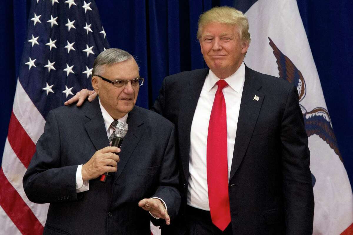 Then-Republican presidential candidate Donald Trump at a campaign event in Iowa on Jan. 26. 2016, with Joe Arpaio, the sheriff of metro Phoenix. Understanding the root causes of Arpaio’s contempt of the law does not excuse it, a reader says, and he should have been treated like any other common criminal.