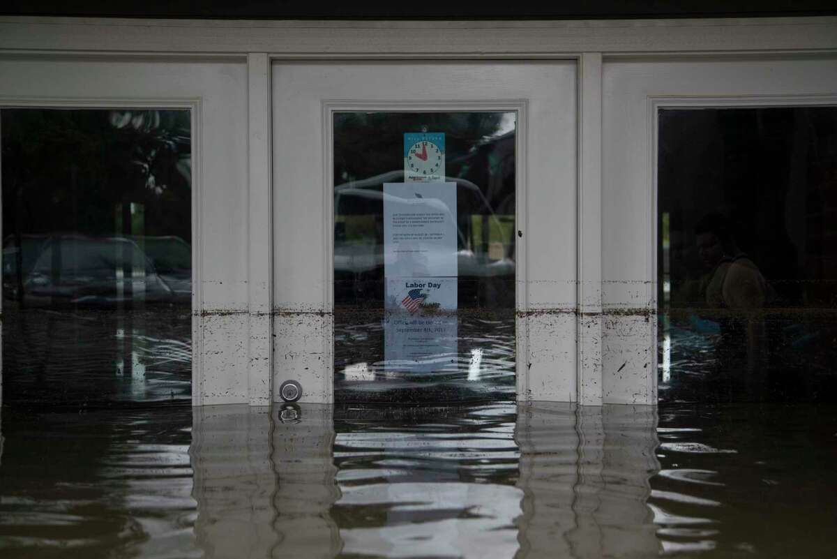Bayou Parc at Oak Forest leasing office under water caused by the Tropical Storm Harvey, Sunday, Aug. 27, 2017, in Houston. ( Marie D. De Jesus / Houston Chronicle )