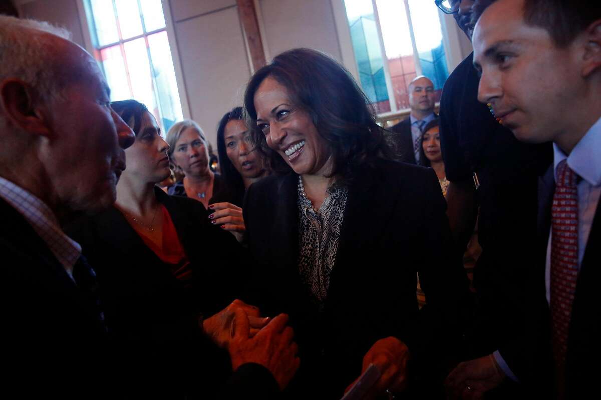 Senator Kamala Harris greets town hall attendees after the town hall at Beebe Memorial Cathedral on Wednesday, August 30, 2017 in Oakland, Calif.