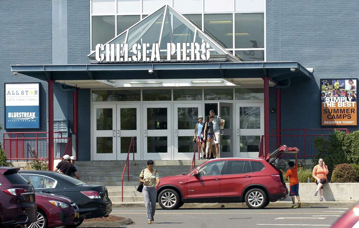 Visitors exit the Chelsea Pier complex were it was reported that a 5-year-old New Canaan boy nearly drowned Thursday afternoon in the pool on August 3, 2017 in Stamford, Connecticut.