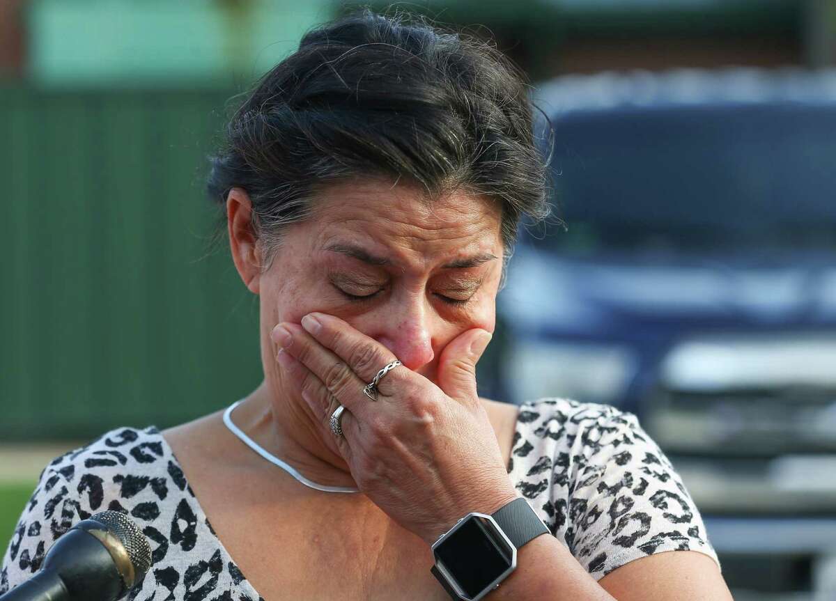 Frances Breaux wipes tears from her face after talking to media about her close friends and neighbors Leo and Lajayne Opelia, both in their 70s, whom she hasn't being able to reach since last night, before the organic peroxides inside the Arkema chemical plant exploded Thursday, Aug. 31, 2017, in Crosby, Texas. The Opelias were mandatorily evacuated from their homes by officials but they decided to sneak back in their home.