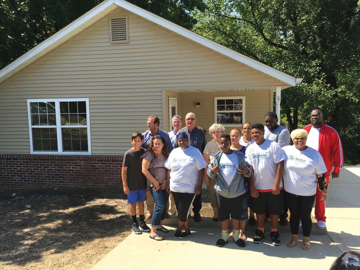 Habitat home gets makeover, family