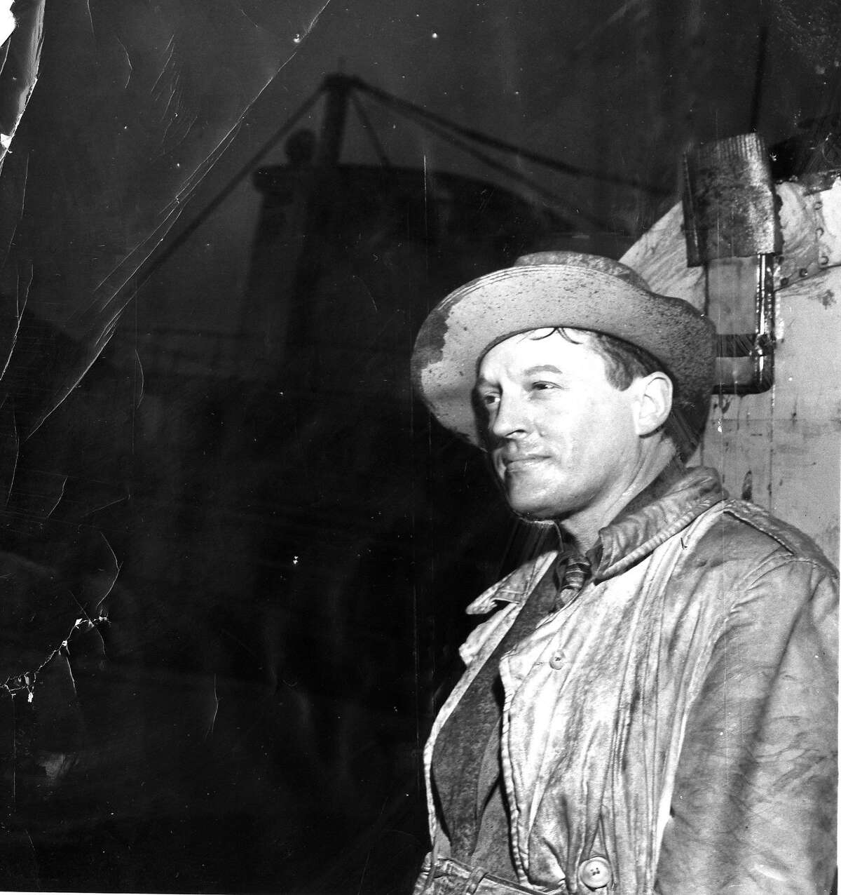 Barney Gould contemplates the sunken Port of Stockton riverboat, he had hoped to convert into a showboat and restaurant, March 12, 1952 Phot ran 3/26/1953, p. 18