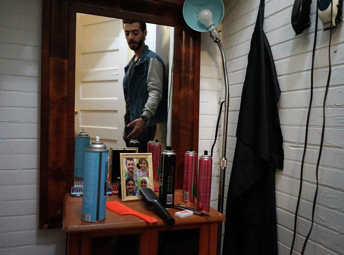 An aspiring hairdresser, Mohammad Shanif, Safeih's son, has converted a closet in his family's Albany apartment into a makeshift hair salon to service friends and family.