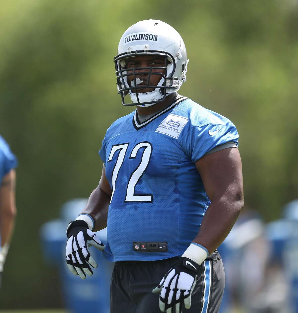 Offensive lineman Laken Tomlinson goes through drills during the Detroit Lions rookie mini camp at the team's Allen Park, Mich., practice facility on May 8, 2015. (Kirthmon F. Dozier/Detroit Free Press/TNS)