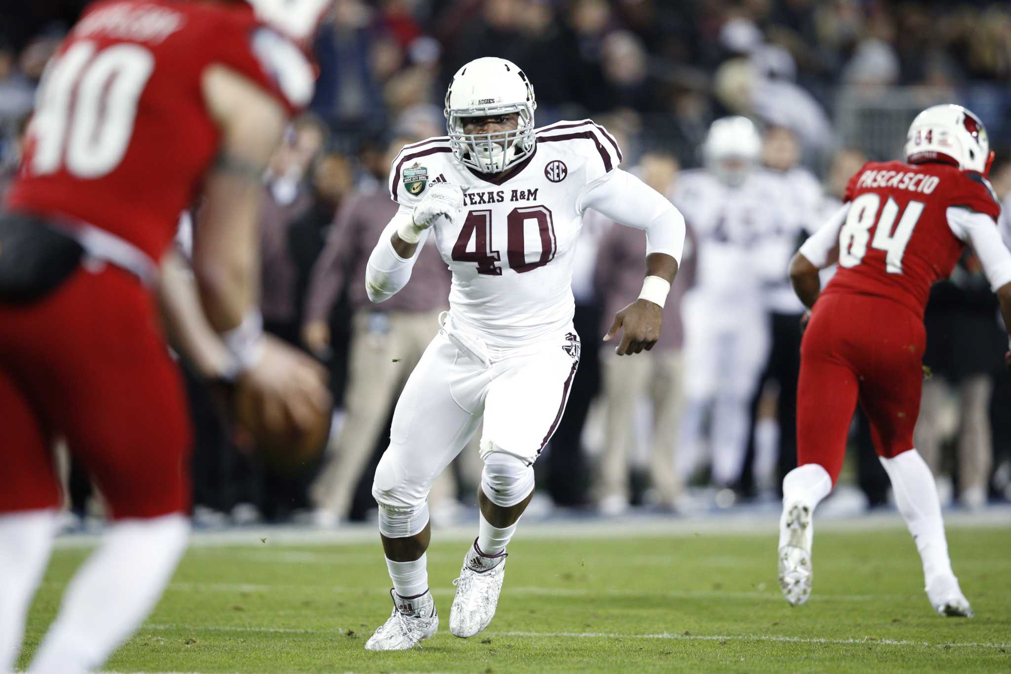 Texas A&M Aggies defensive lineman Myles Garrett in a four point News  Photo - Getty Images