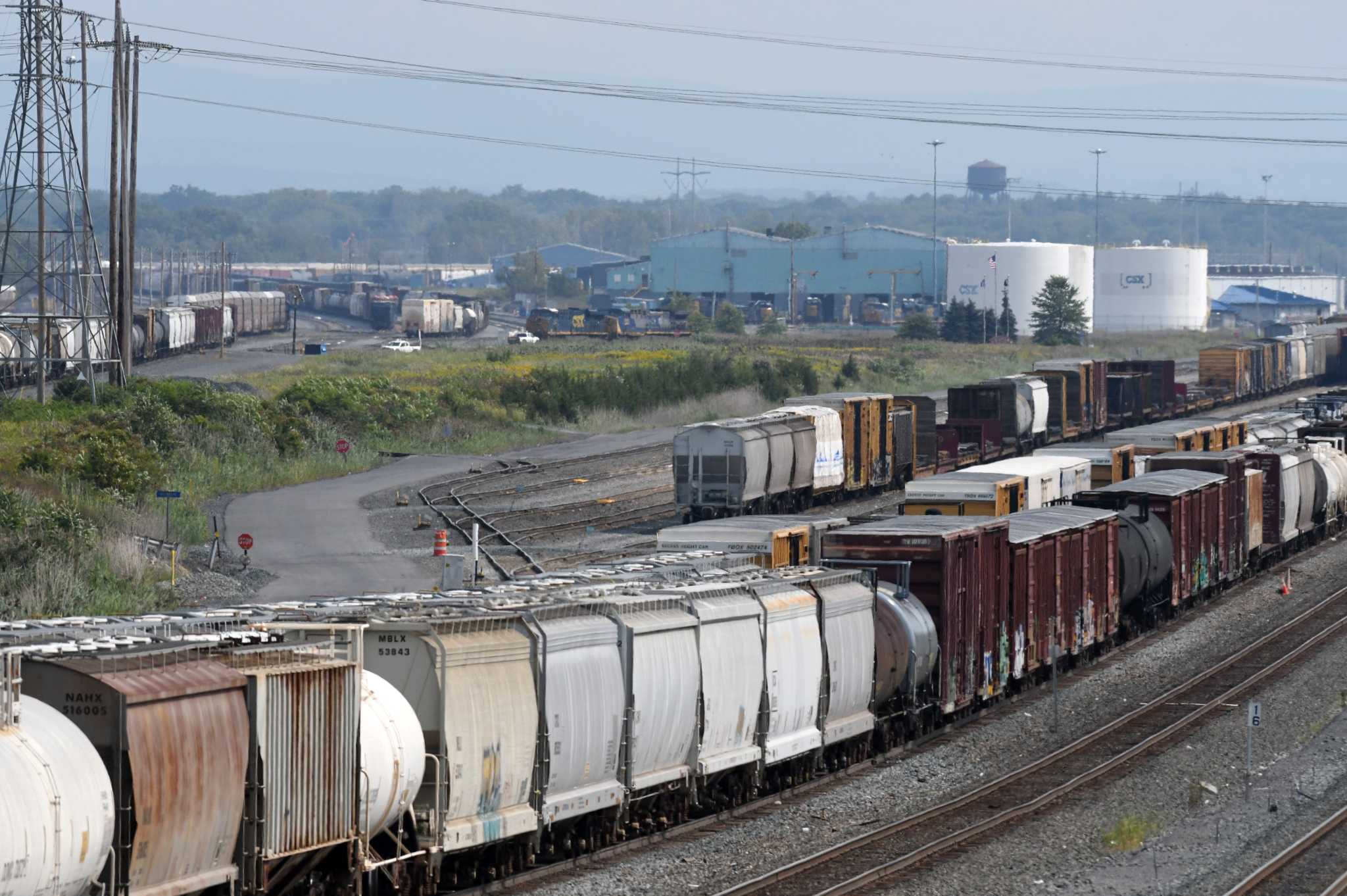 CSX cuts management, unionized workers