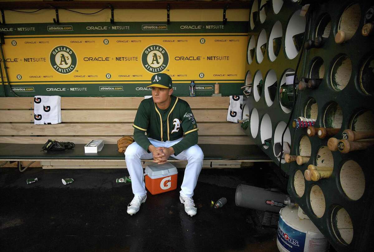 OAKLAND, CA - AUGUST 12: Matt Chapman #26 of the Oakland Athletics looks on from the dugout prior to the start of the game against the Oakland Athletics at Oakland Alameda Coliseum on August 12, 2017 in Oakland, California. (Photo by Thearon W. Henderson/Getty Images)