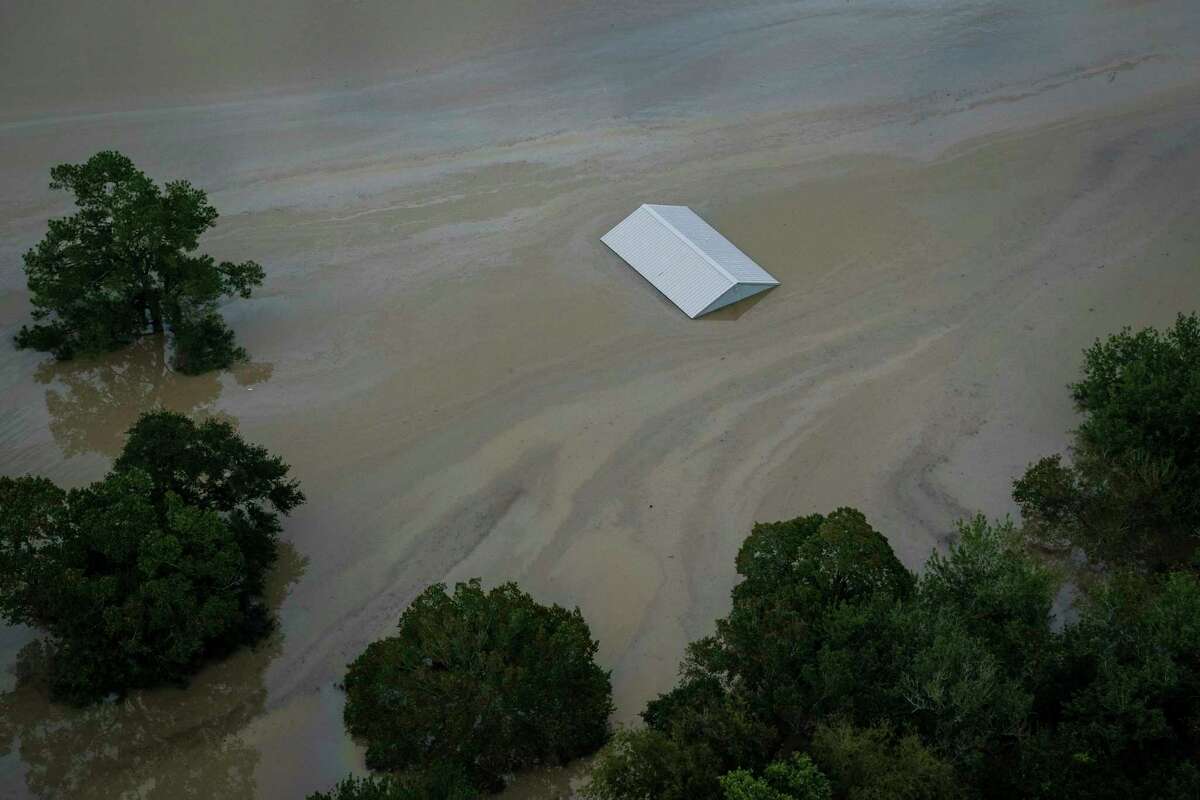 Flood waters surround buildings in West Houston, Texas.