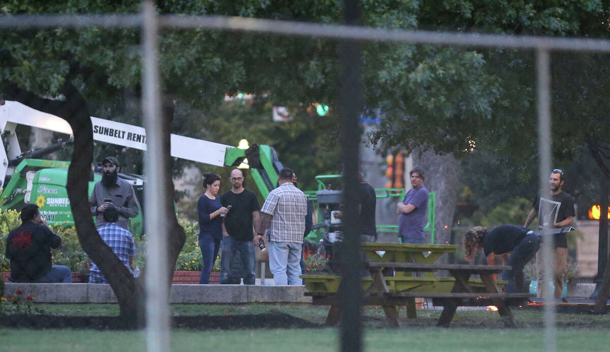 Crews work Friday September 1 , 2017 to remove the pedestal of the Confederate war memorial at Travis Park in San Antonio, Texas. The statue itself was removed earlier in the morning at about 2:00 a.m. and placed on a flatbed truck. San Antonio's City Council recently voted to have the memorial removed from the park.