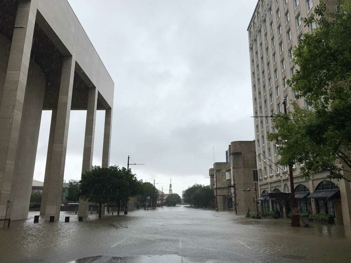 The Lancaster Hotel, at right, took on water during Hurricane Harvey.