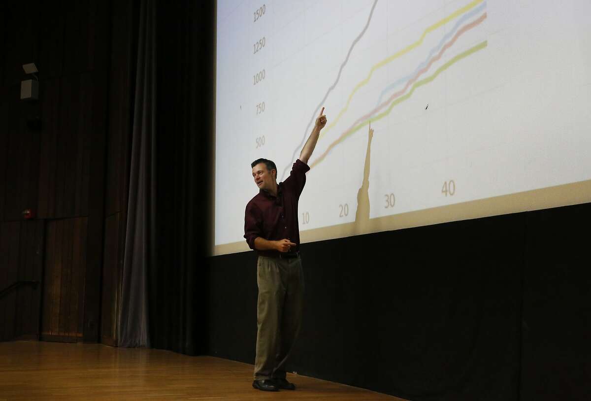 Professor David Wagner goes over a chart that is analyzing data during the first day of the Foundations of Data Science course at UC Berkeley campus August 23, 2017 in Berkeley, Calif.