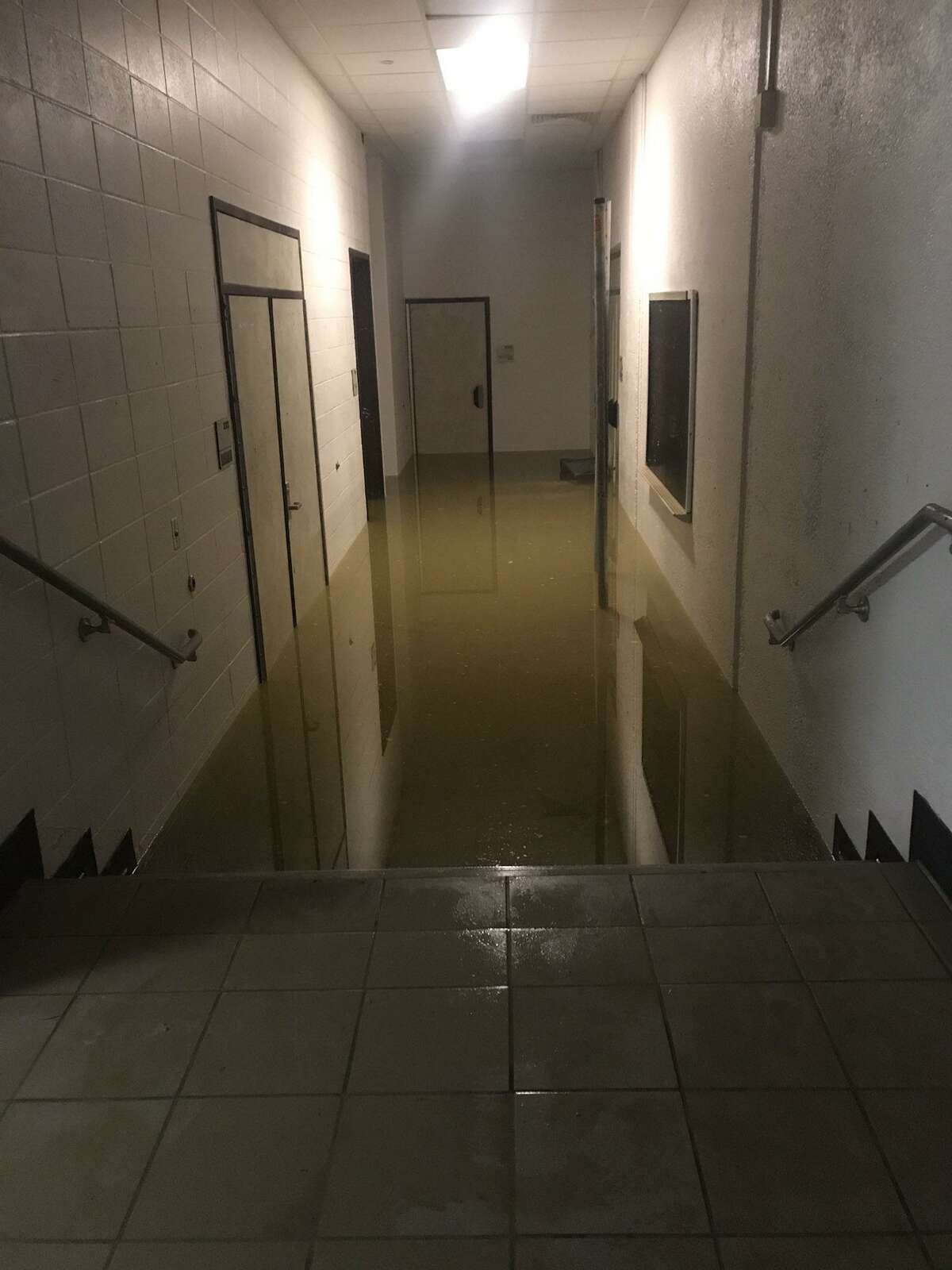 This photo posted by Humble ISD Superintendent Elizabeth Fagen shows a hallway at Kingwood High School inundated with several feet of flooding as a result of Tropical Storm Harvey.