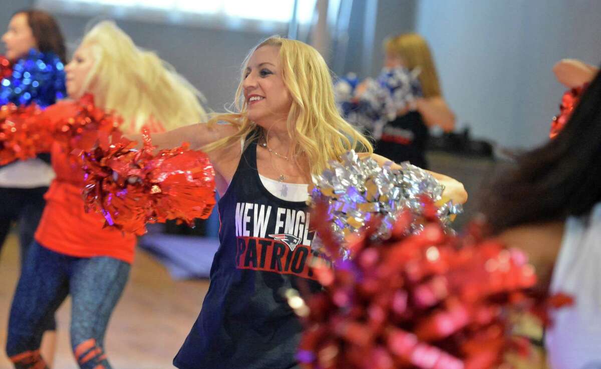 Past, present Patriots cheerleaders reunite to perform