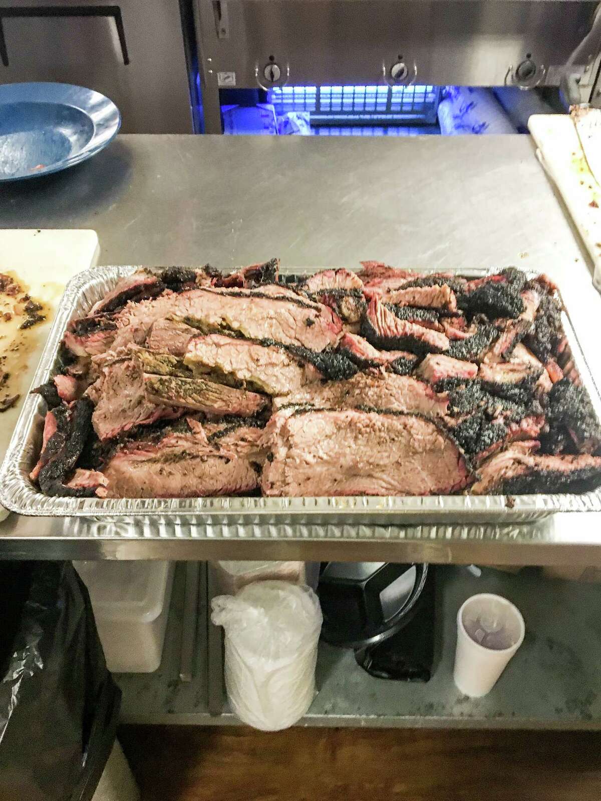A tray of brisket at Tin Roof BBQ, prepared for first responders in Kingwood after Hurricane Harvey