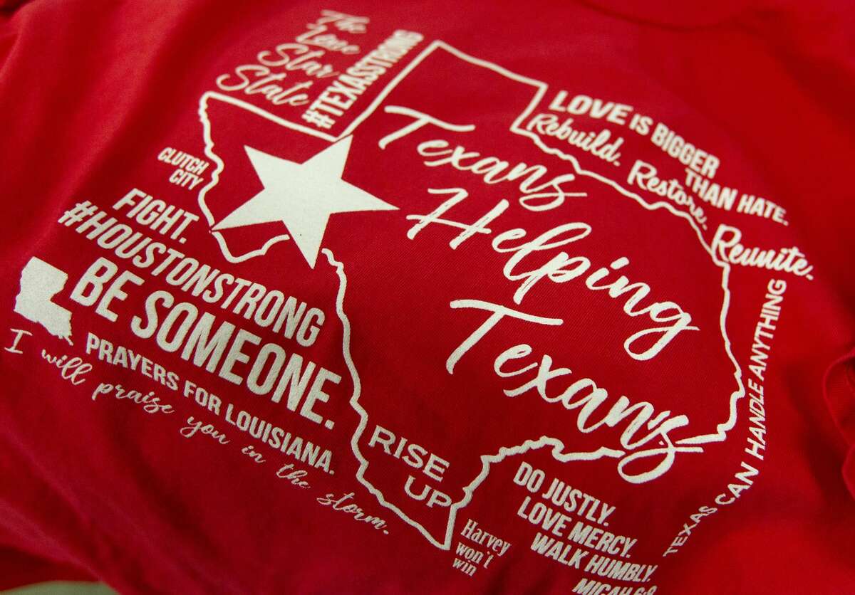 T-Shirts Plus printed 2,000 t-shirt to give to Montgomery County shelters for Tropical Storm Harvey evacuees, Thursday, Aug. 31, 2017, in Conroe. The business itself was flooded, but was able to reopen after 24 hours and began printing shirts for shelters.