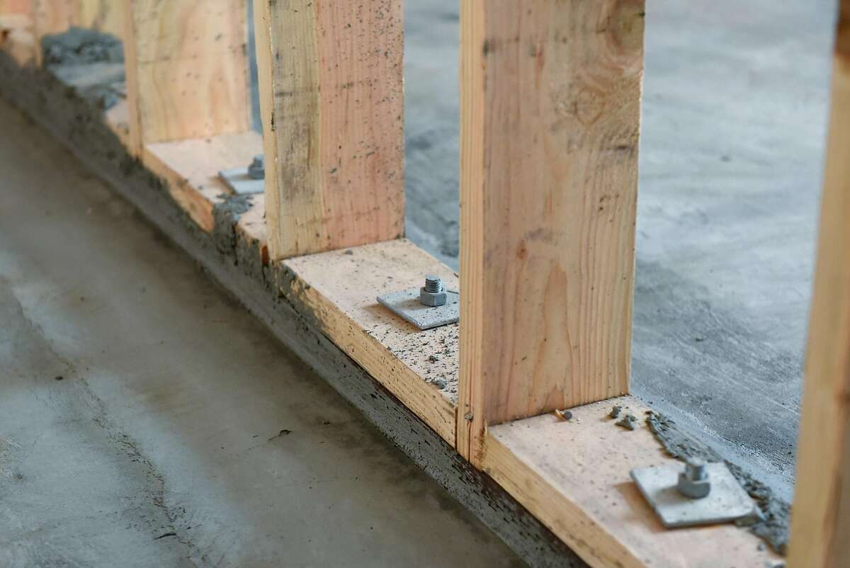 Anchor points are seen on a new support wall as SGDM contractors retrofit a mixed residential and commercial building in San Francisco, Calif., on Thursday August 31, 2017. Property owners in San Francisco are scrambling to retrofit their buildings as a new deadline looms for bringing buildings into compliance with the earthquake safety focused "soft story" ordinance.