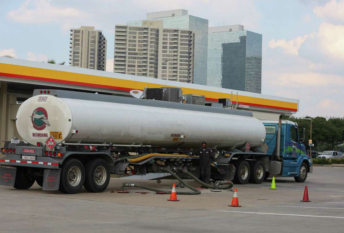 A fuel truck driver resupplies the Shell station at Weslayan and the U.S. 59 frontage road on Friday. With many refineries closed on the Gulf Coast, the fuel supply is being pinched.