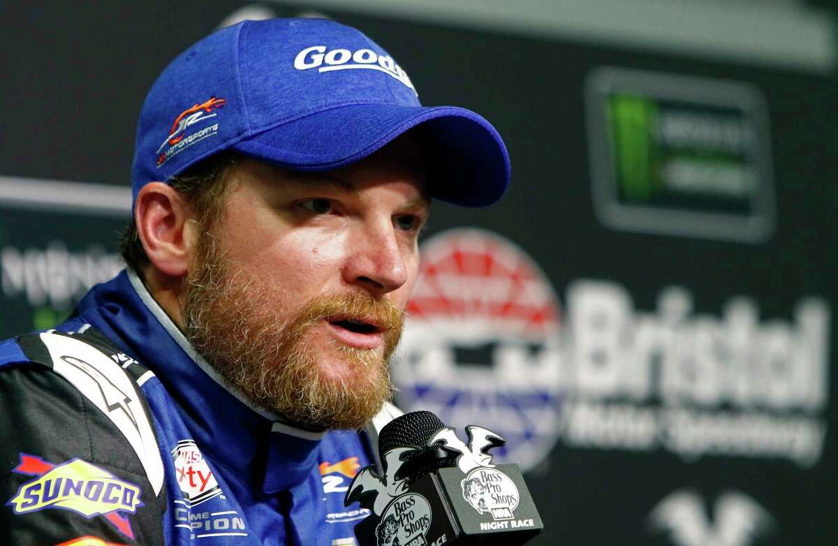 FILE - In this Aug. 17, 2017, file photo, NASCAR driver Dale Earnhardt Jr. speaks during a press conference at Bristol Motor Speedway in Bristol, Tenn. Earnhardt is preparing for the end of his NASCAR career and understands it likely won't finish the way he hoped when he returned from injury this season. (AP Photo/Wade Payne, File)