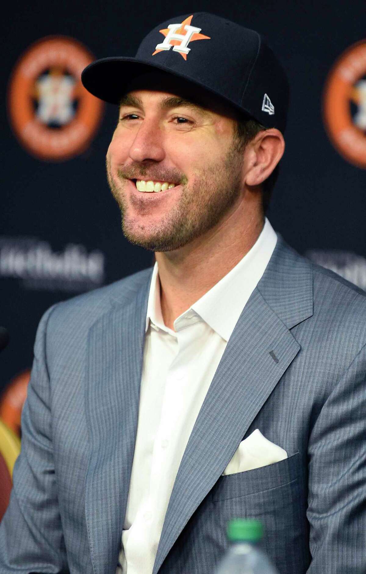 Houston Astros pitcher Justin Verlander smiles during a press conference introducing Verlander before a baseball game against the New York Mets, Sunday, Sept. 3, 2017, in Houston. Verlander was traded to Houston from the Detroit Tigers on Thursday. (AP Photo/Eric Christian Smith)