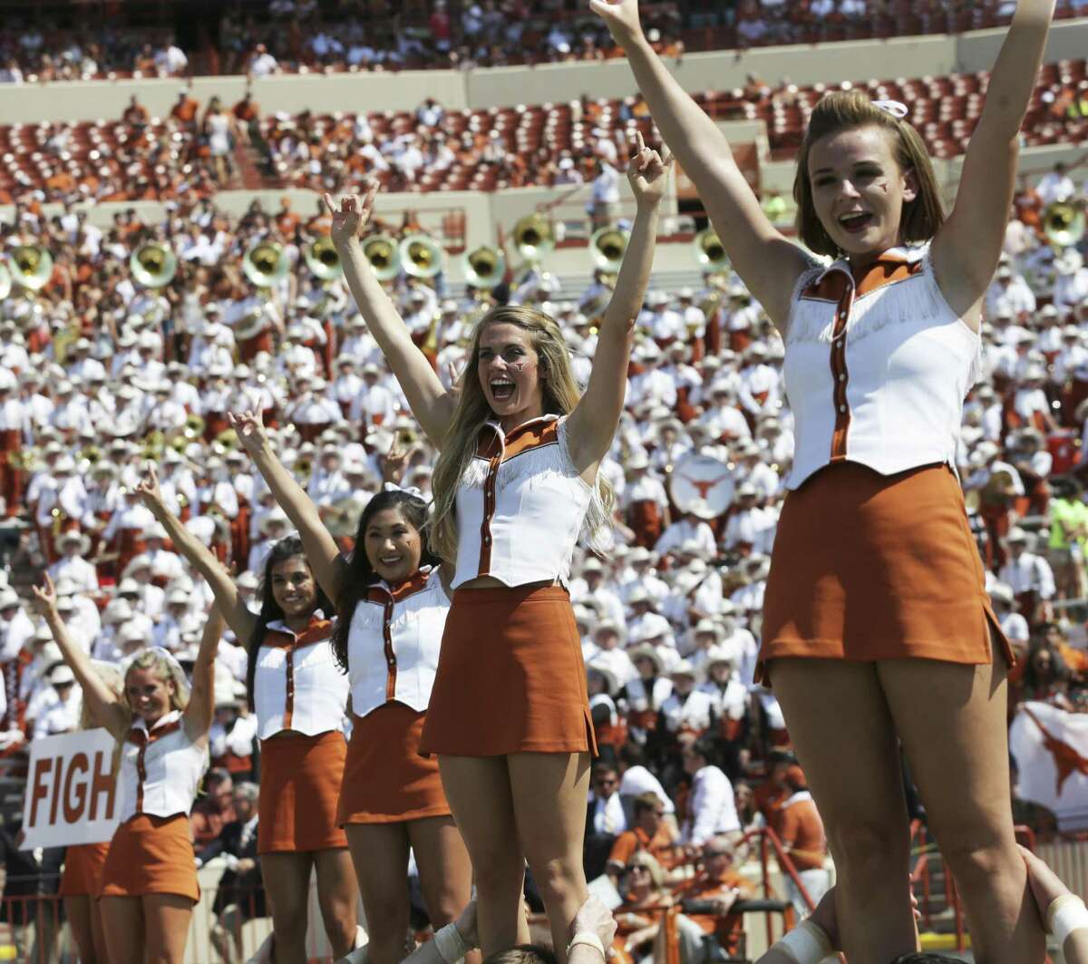 Cheerleaders get the fans roused as Texas plays Maryland at DKR Stadium on September 2, 2017.