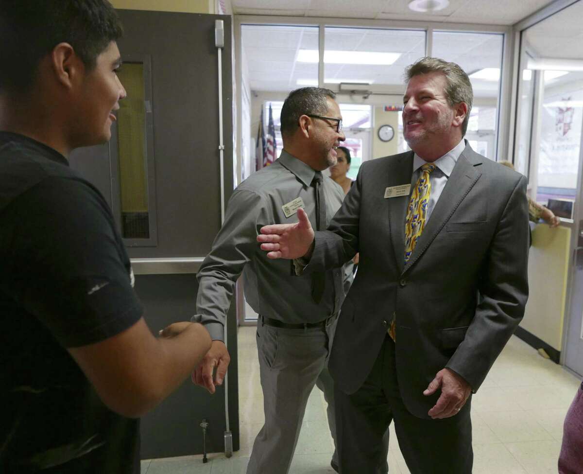 Southside ISD Superintendent Mark Eads greets student Mark Gomez on the first day of registration, Tuesday, Aug. 8, 2017. Mark will be a student at Julia Matthey Middle School.