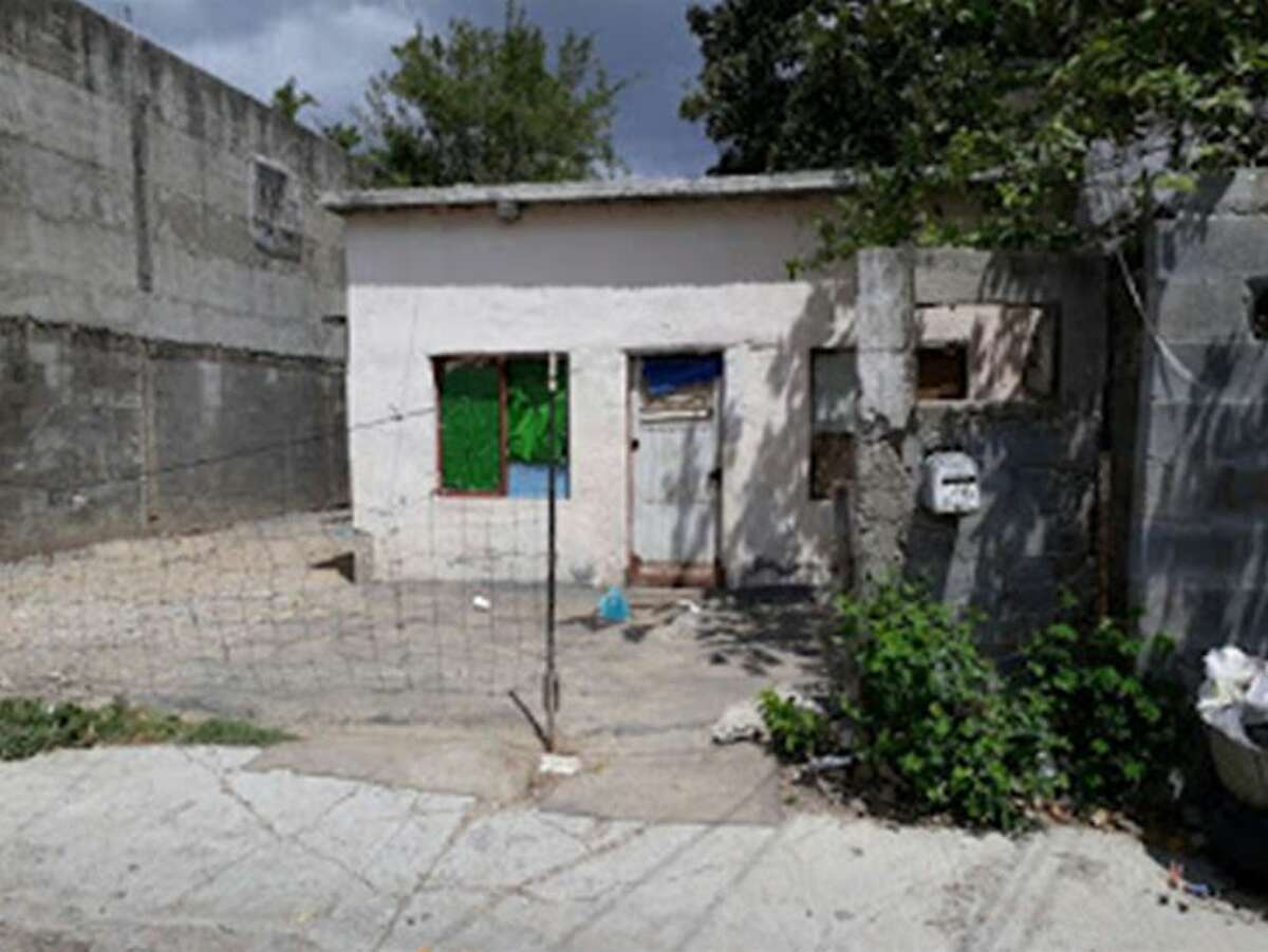 Tamaulipas authorities said this home in Nuevo Laredo, Mexico, is where a couple held 11 immigrants against their will. 