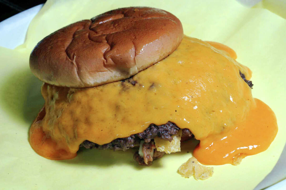 Chris Madrid’s, 1900 Blanco Road: Macho size Tostada Burger, loaded with refried beans and melted cheddar.