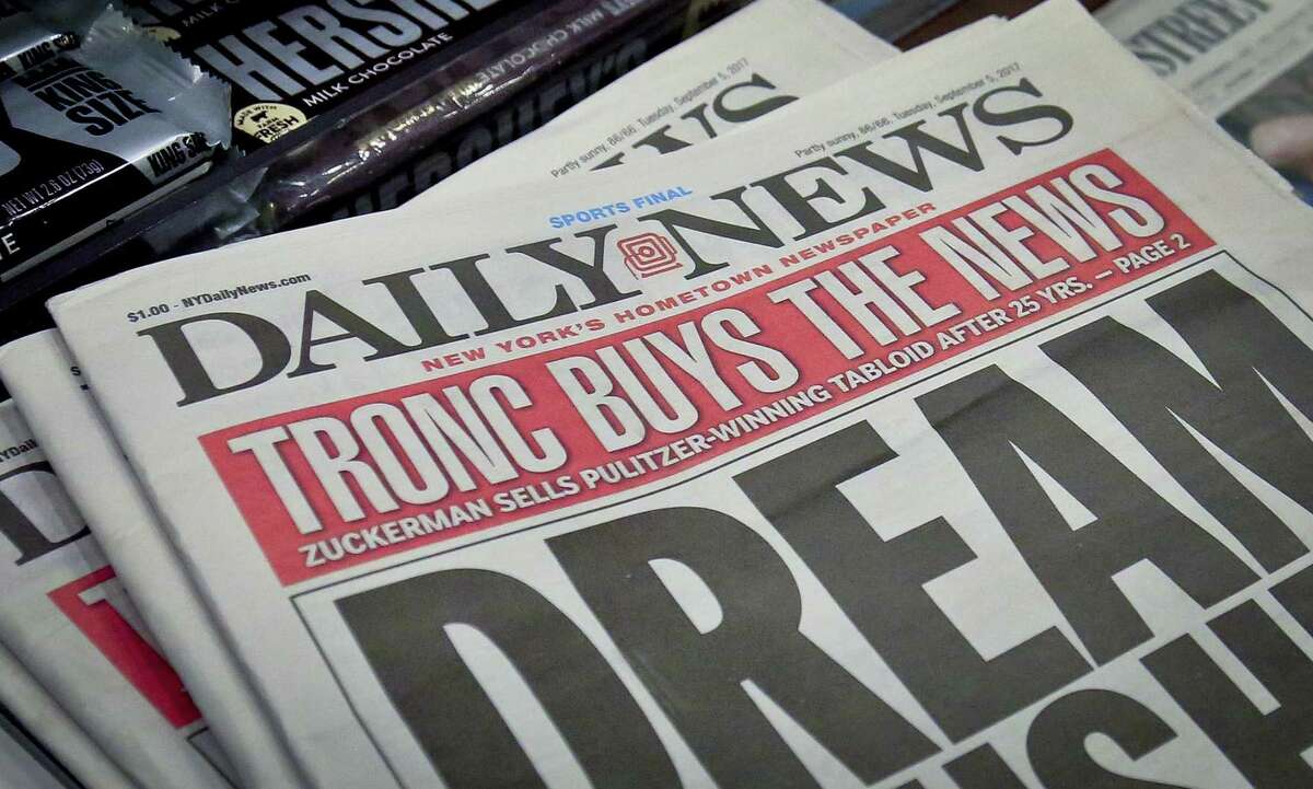 A newsstand display copies of the Daily News on Tuesday in New York. The tabloid newspaper has been acquired by Tronc, the publisher of the Los Angeles Times and the Chicago Tribune, in a deal announced Monday night.