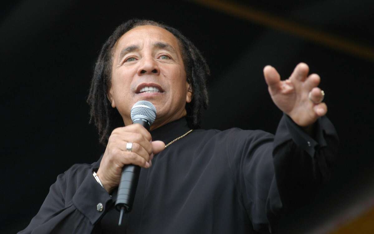 Smokey Robinson performs at The New Orleans Jazz & Heratige Festival in New Orleans, Sunday, May 2, 2004. (AP Photo/Burt Steel)